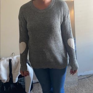 Gray knit sweater with heart patches